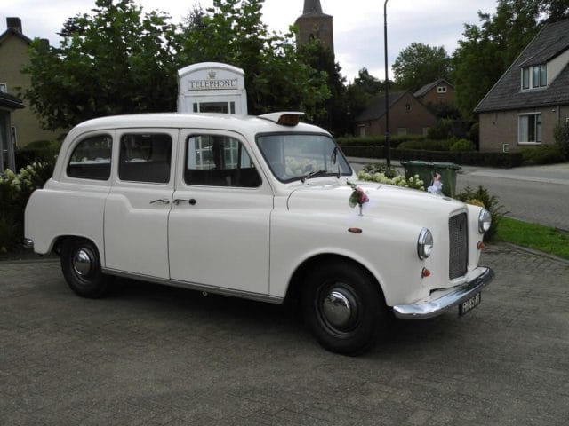 witte engelse taxi huren